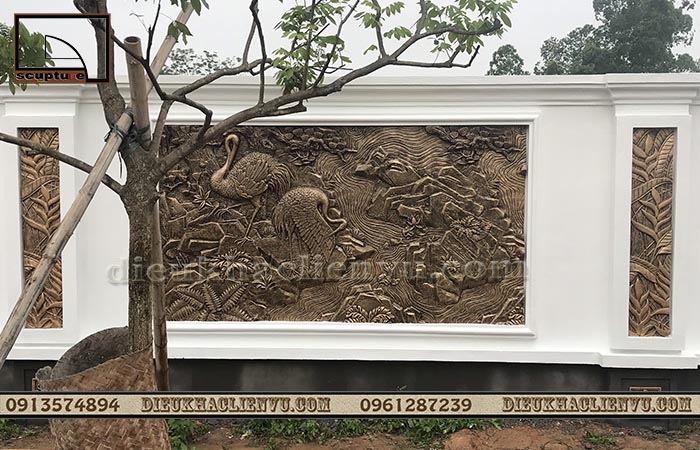 Tiểu cảnh tranh đá ốp tường kết hợp cây xanh, hòn non bộ, đài phun nước